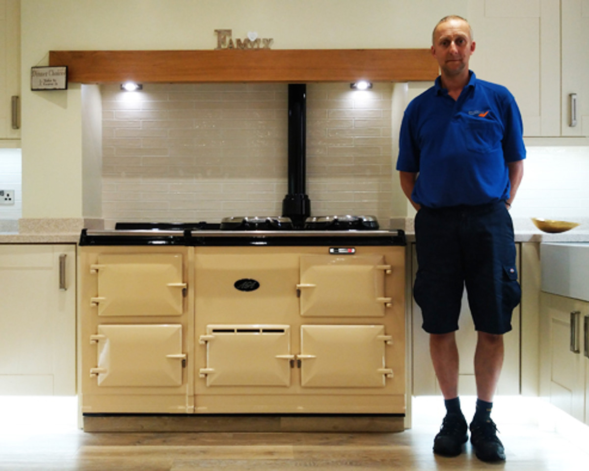 Bob beside an AGA oven